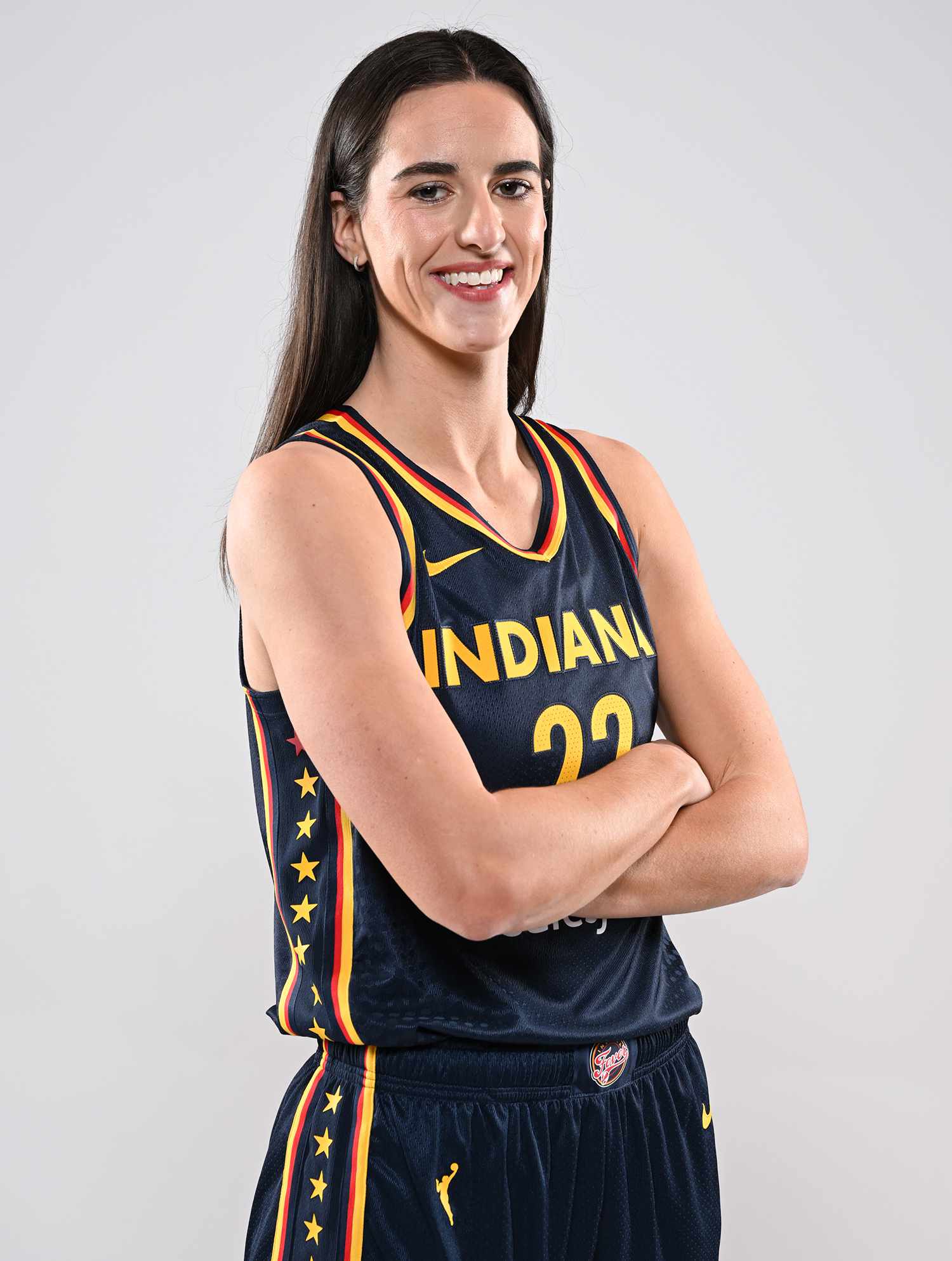 Caitlin Clark #22 of the Indiana Fever poses for a portrait at Gainbridge Fieldhouse during her introductory press conference on April 17, 2024