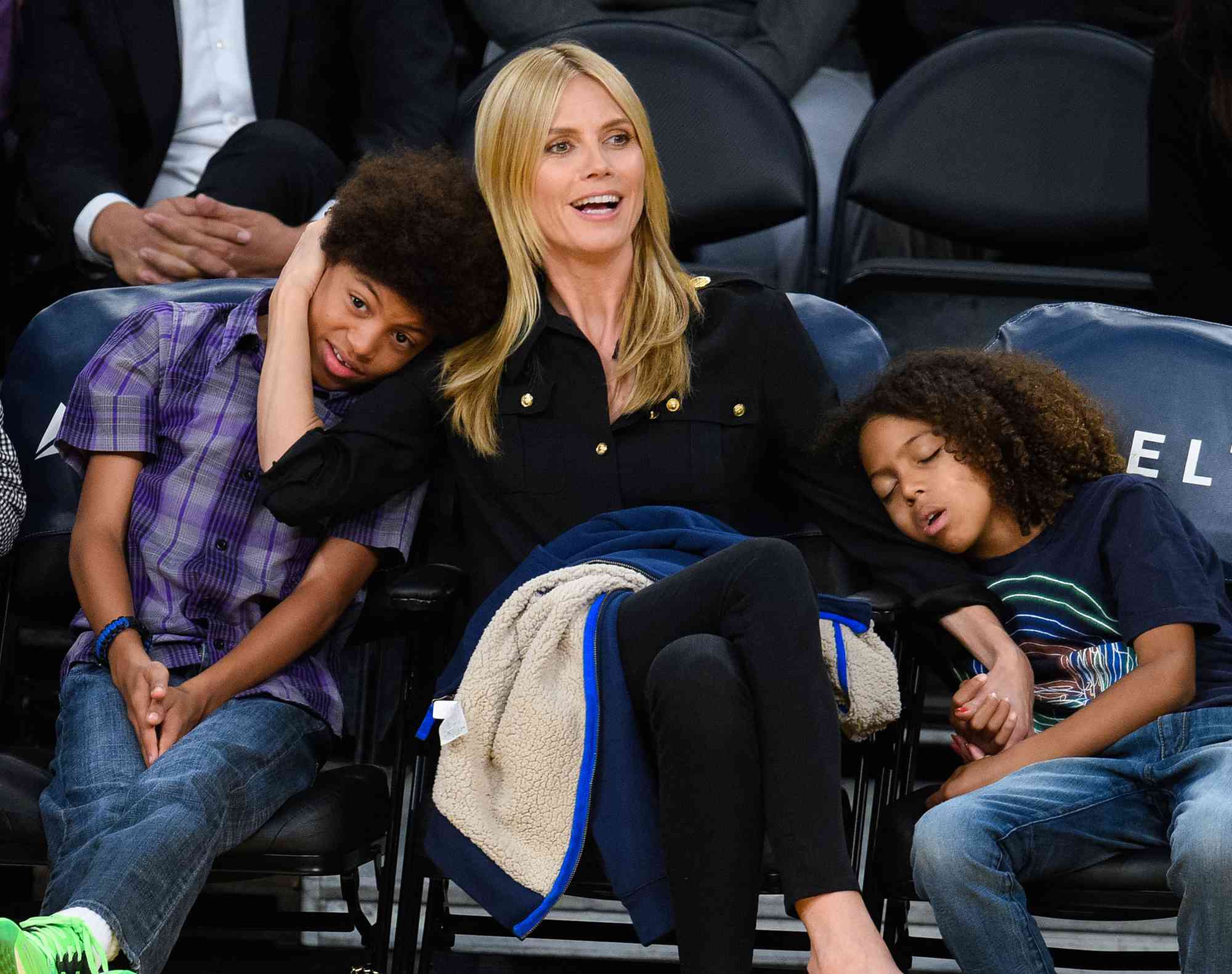 Henry Samuel, Heidi Klum and Johan Samuel attend a basketball game between the New Orleans Pelicans and the Los Angeles Lakers at Staples Center on April 1, 2015 in Los Angeles, California