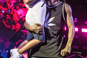 Wiz Khalifa and his son Sebastian Taylor Thomaz perform at FivePoint Amphitheatre on August 09, 2019 in Irvine, California.