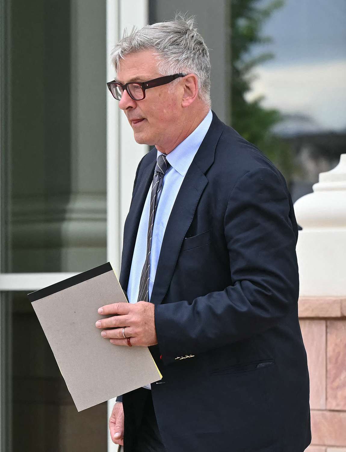 US actor Alec Baldwin exits the courthouse after appearing in court during a pretrial hearing ahead of his trial for involuntary manslaughter in Santa Fe, New Mexico, on July 8, 2024. Jury selection in Baldwin's trial is set to begin on July 9. In October 2021, on the New Mexico set of his low-budget Western "Rust," a gun pointed by Baldwin discharged a live round, killing the film's cinematographer Halyna Hutchins and wounding its director.