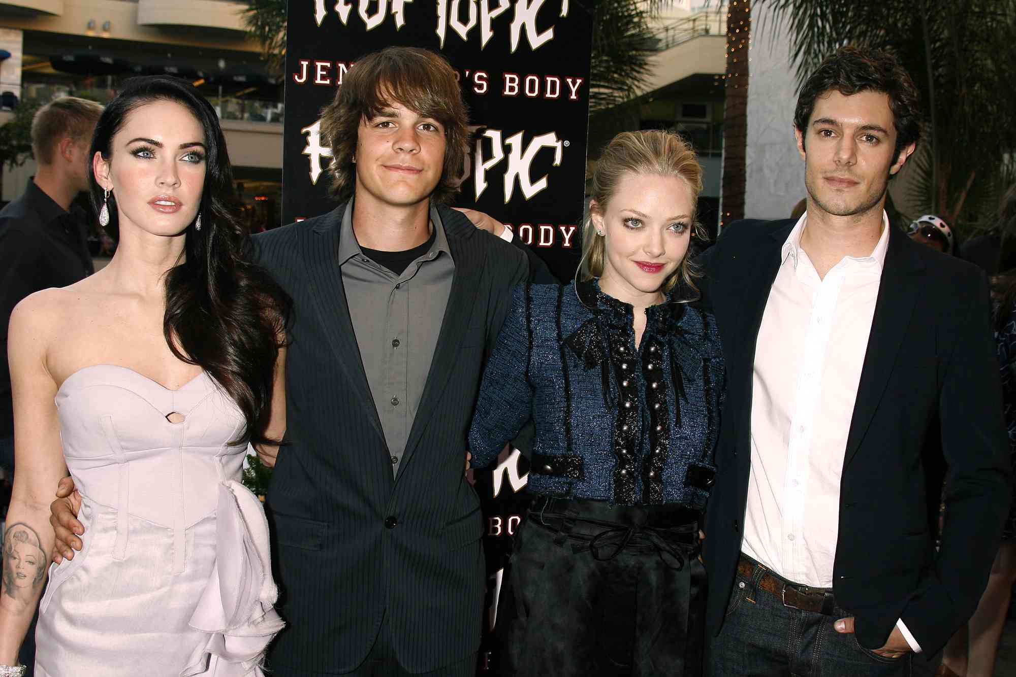 Actors Megan Fox, Johnny Simmons, Amanda Seyfried and Adam Brody arrive at "Jennifer's Body" Hot Topic Fan Event at Hot Topic on September 16, 2009 in Hollywood, California.