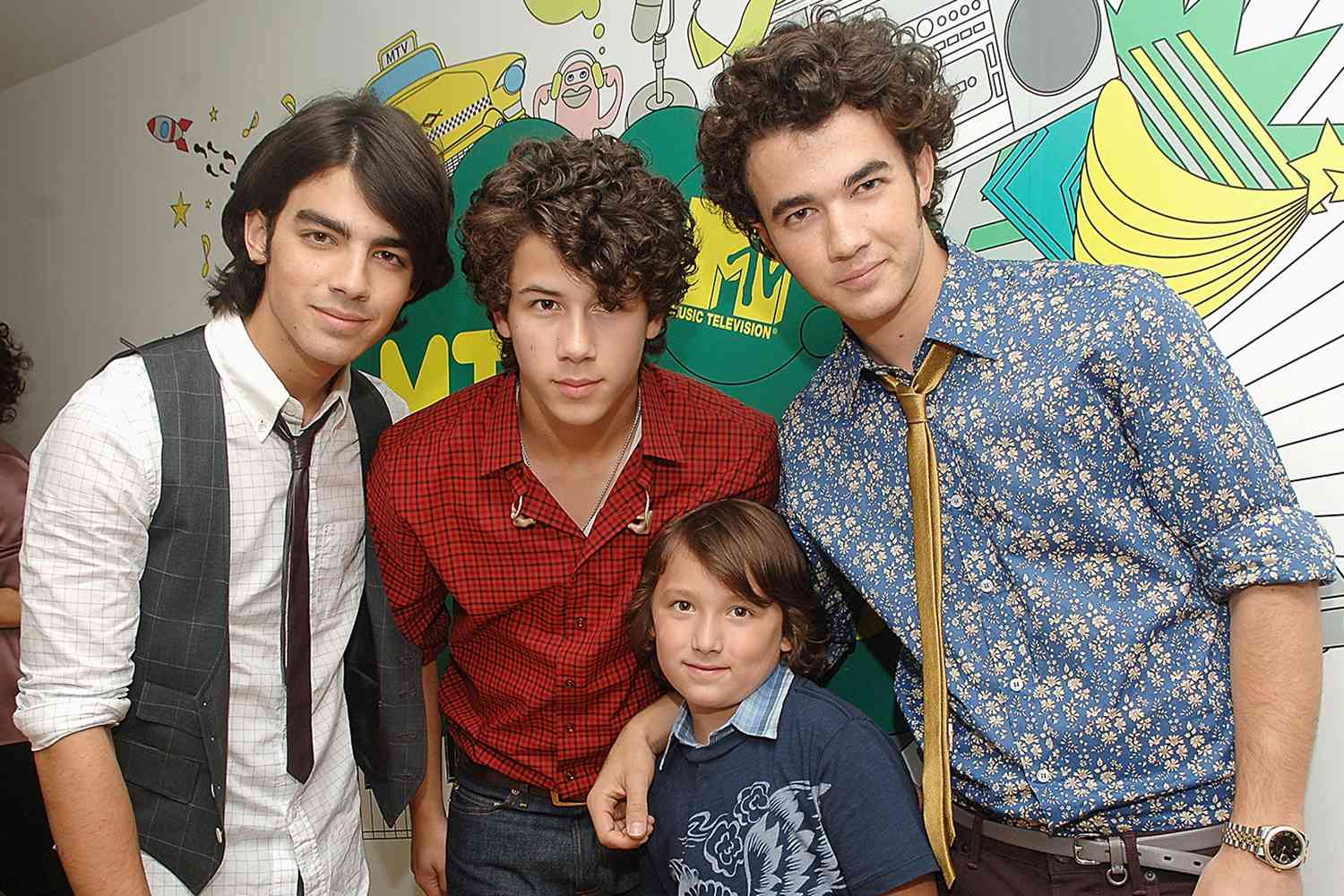 Joe Jonas, Nick Jonas and Kevin Jonas of The Jonas Brothers with Frankie Jonas visits MTV's "TRL" at MTV studios on August 12, 2008