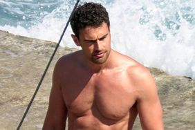 Theo James shows off his toned physique while pictured filming steamy scenes with Leonardo Dicaprio's girlfriend Vittoria Ceretti for a new Dolce and Gabbana commercial in Capri!