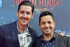 Singer Jonathan Knight and Harley Rodriguez arrive at the grand re-opening of Boston's Emerson Colonial Theatre with the gala performance of "Moulin Rouge! The Musical" at Emerson Colonial Theatre on July 29, 2018 in Boston, Massachusetts.