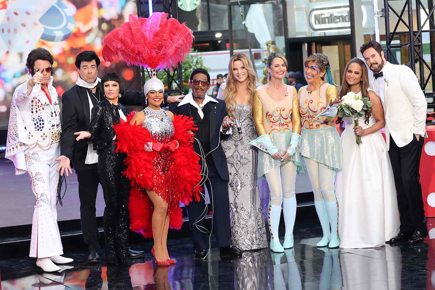 Willie Geist, Carson Daly, Dylan Dryer, Sheinelle Jones, Al Roker, Jenna Bush Hager, Savannah Guthrie, Hoda Kotb, Kristen Welker and Peter Alexander are seen attending Halloween at the 'Today' show at the Rockefeller Plaza on October 31, 2022 in New York City.