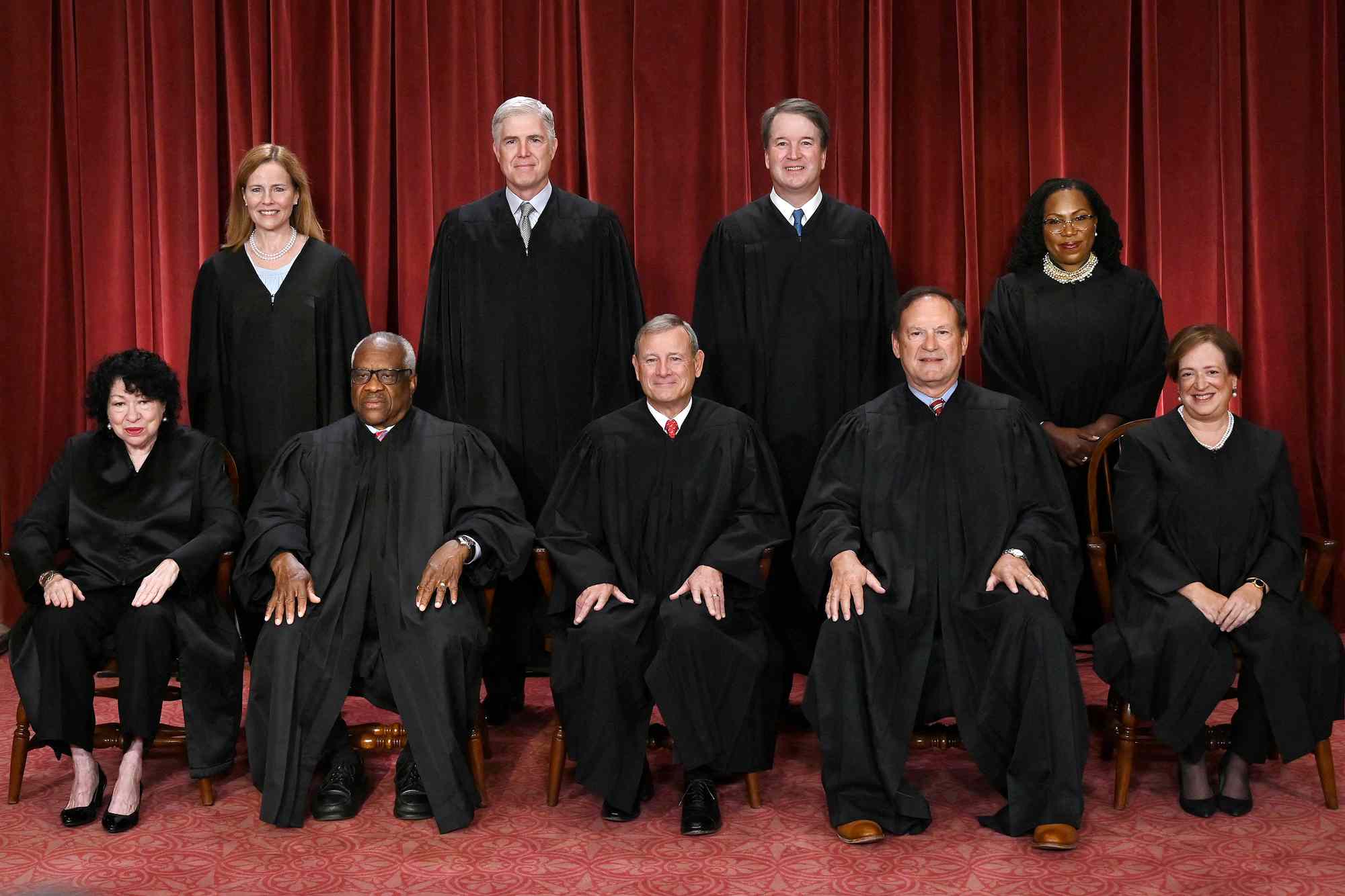 Justices of the US Supreme Court pose for their official photo at the Supreme Court in Washington, DC on October 7, 2022. - (Seated from left) Associate Justice Sonia Sotomayor, Associate Justice Clarence Thomas, Chief Justice John Roberts, Associate Justice Samuel Alito and Associate Justice Elena Kagan, (Standing behind from left) Associate Justice Amy Coney Barrett, Associate Justice Neil Gorsuch, Associate Justice Brett Kavanaugh and Associate Justice Ketanji Brown Jackson.