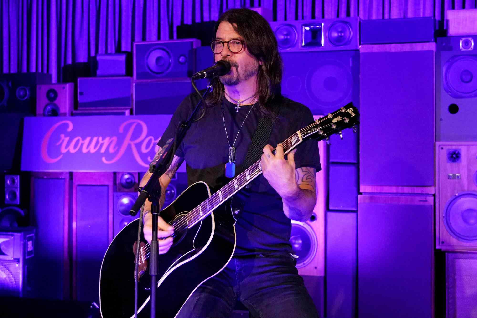 PHOENIX, ARIZONA - FEBRUARY 10: Dave Grohl kicks off Super Bowl weekend with an exclusive acoustic performance for veterans and local hospitality personnel at Crown Royal’s pre-game party experience at Crescent Ballroom on February 10, 2023 in Phoenix, Arizona. (Photo by Kevin Mazur/Getty Images for Crown Royal)