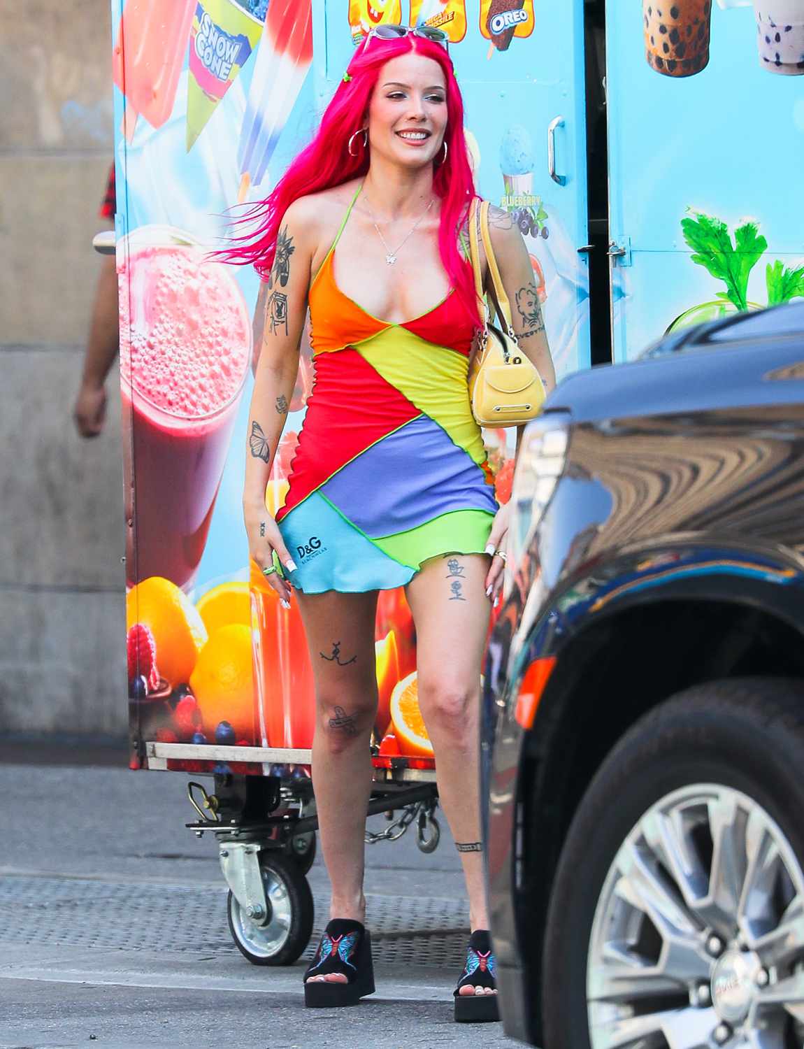 Halsey showcased her vibrant pink hair while shooting a video in a New York City subway station. 