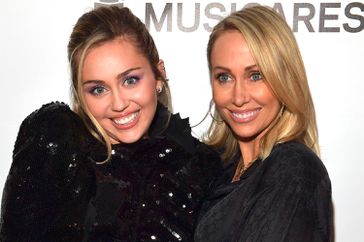 Miley Cyrus and Tish Cyrus attend MusiCares Person of the Year honoring Dolly Parton