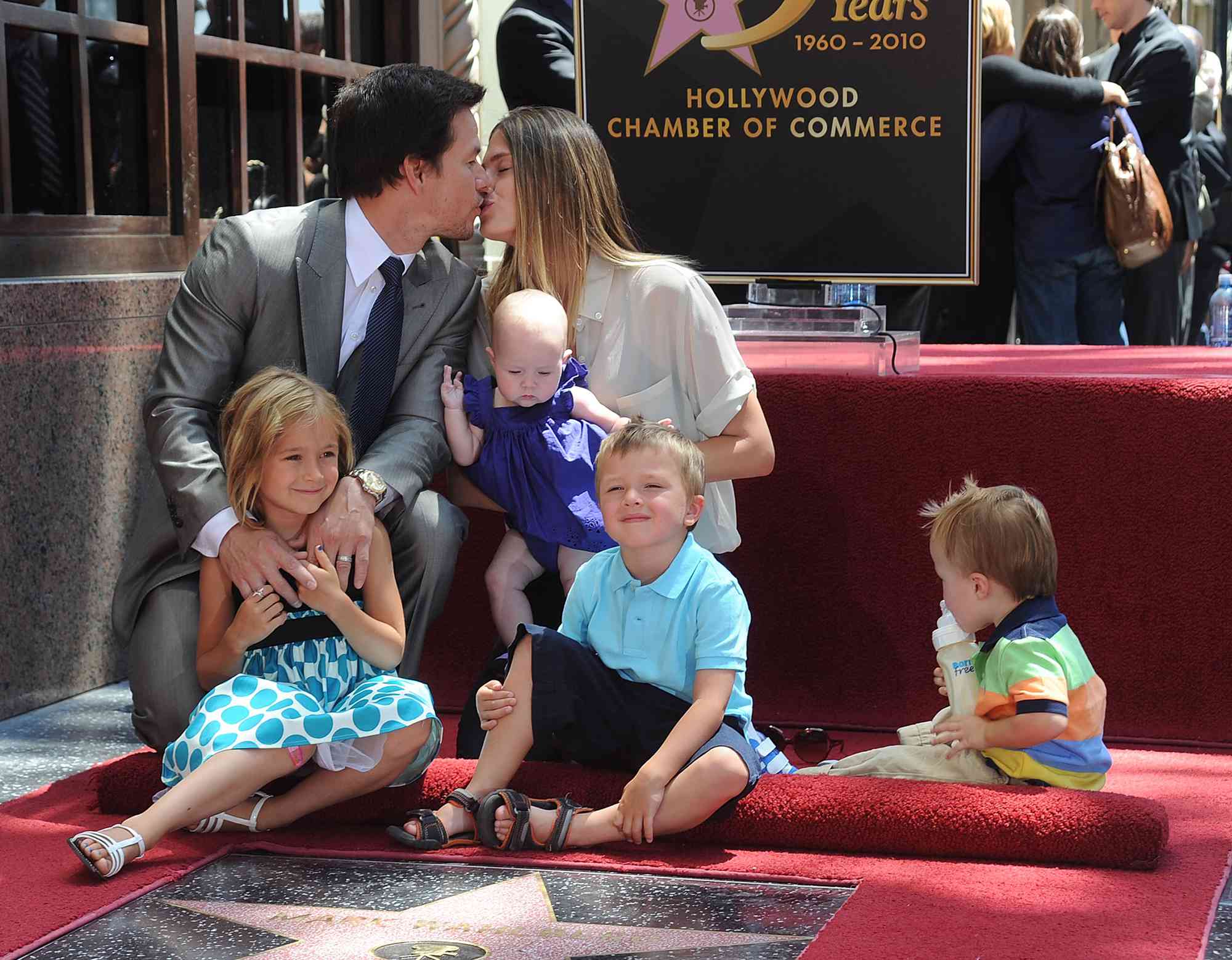 Mark Wahlberg is honored on The Hollywood Walk Of Fame with the 2414th Star poses with his family wife Rhea Durham and their children Ella, Michael, Brendan, and Graceon July 29, 2010 in Hollywood, California