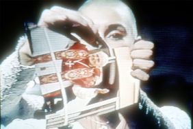 Singer Sinead O'Connor rips up a picture of Pope John Paul II October 3, 1992 on the TV show "Saturday Night Live".