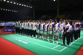 In this photo released Indonesian Badminton Association (PBSI), players and official observe a moment of silence for Chinese badminton player Zhang Zhi Jie who died after collapsing while playing at Asia Junior Championships Sunday night, at Amongrogo Stadium in Yogyakarta, Indonesia, Monday, July 1, 2024