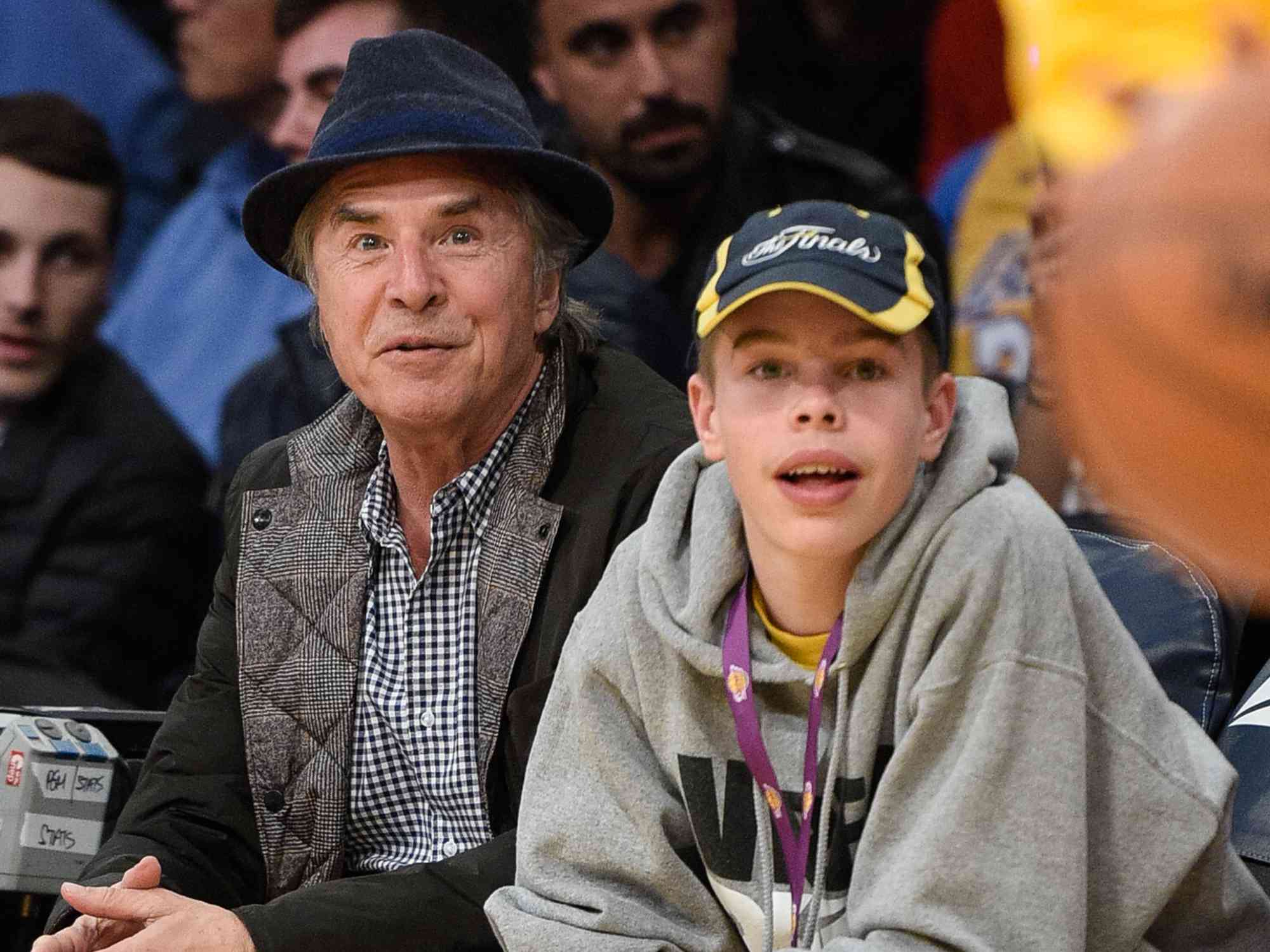 Don Johnson and his son Jasper Johnson attend a basketball between Philadelphia 76ers and the Los Angeles Lakers at Staples Center on January 1, 2016 in Los Angeles, California