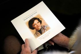 A guest holds the funeral program before the funeral service for former first lady Rosalynn Carter at Maranatha Baptist Church, in Plains, Georgia, on November 29, 2023.