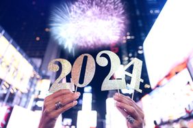 People hold the number 2024, celebration conceptual image for New Year's