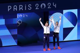 Sarah Bacon and Kassidy Cook of Team United States acknowledge the fans prior to the Women's Synchronised 3m Springboard Final