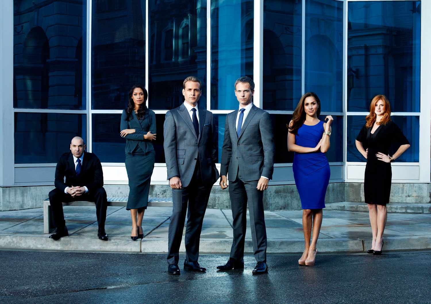 SUITS -- Season: 2 -- Pictured: (l-r) Rick Hoffman as Louis Litt, Gina Torres as Jessica Pearson, Gabriel Macht as Harvey Specter, Patrick J. Adams as Mike Ross, Meghan Markle as Rachel Zane, Sarah Rafferty as Donna --