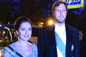 Crown Prince Leka Zogu II, the grandson of self-proclaimed King Zog and his wife Elia Zaharia arrive to attend a dinner during the wedding of Grand Duke George Mikhailovich Romanov, and Victoria Romanovna Bettarini in Saint Petersburg, on October 1, 2021.