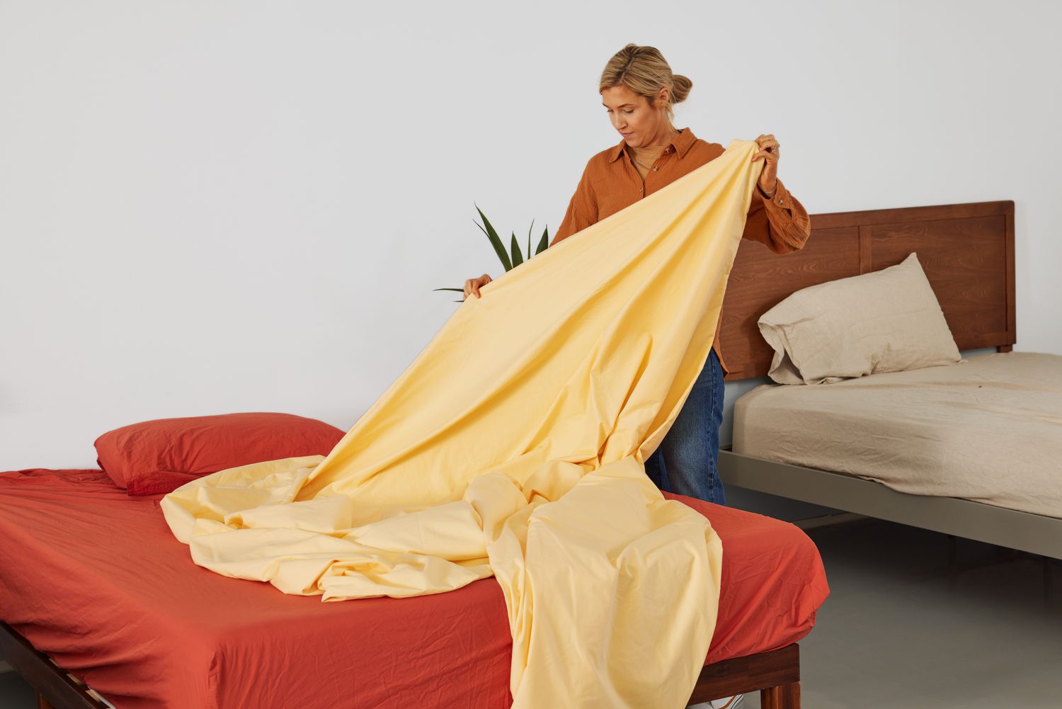 A person lifting up the L.L. Bean 280-Thread-Count Pima Cotton Percale Comforter Cover