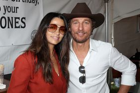 Camila McConaughey (L) and Matthew McConaughey attend a tailgate party to celebrate the launch of their new Pantalones Tequila and Matthew's 54th birthday before the Longhorns defeated Kansas State at The University of Texas at Austin on November 04, 2023 in Austin, Texas.