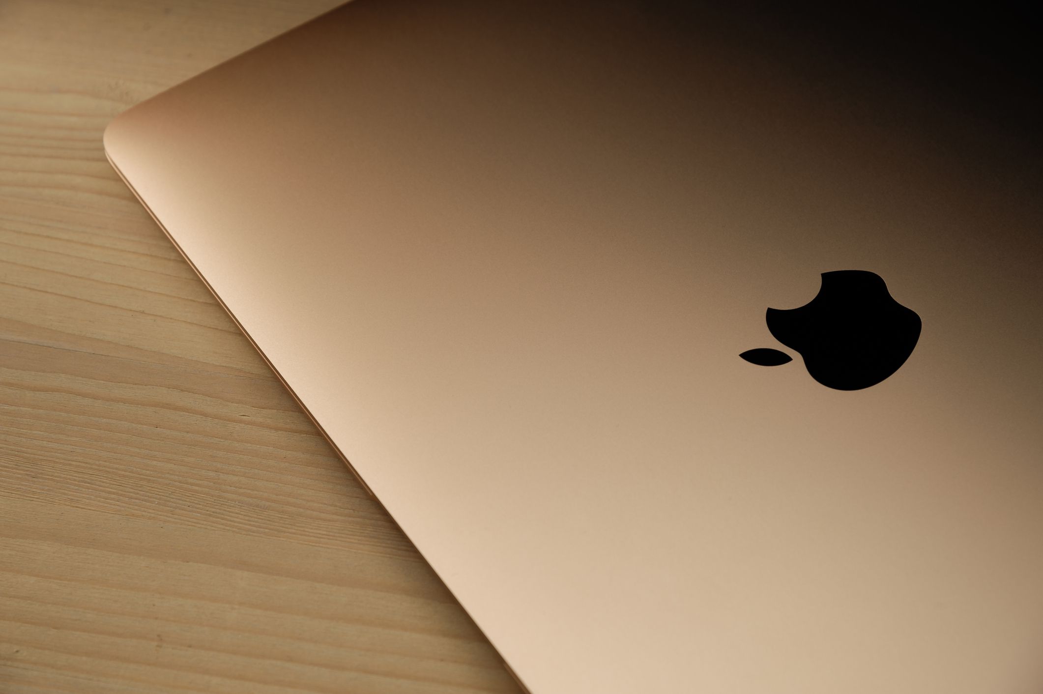 A MacBook Air with a gold finish