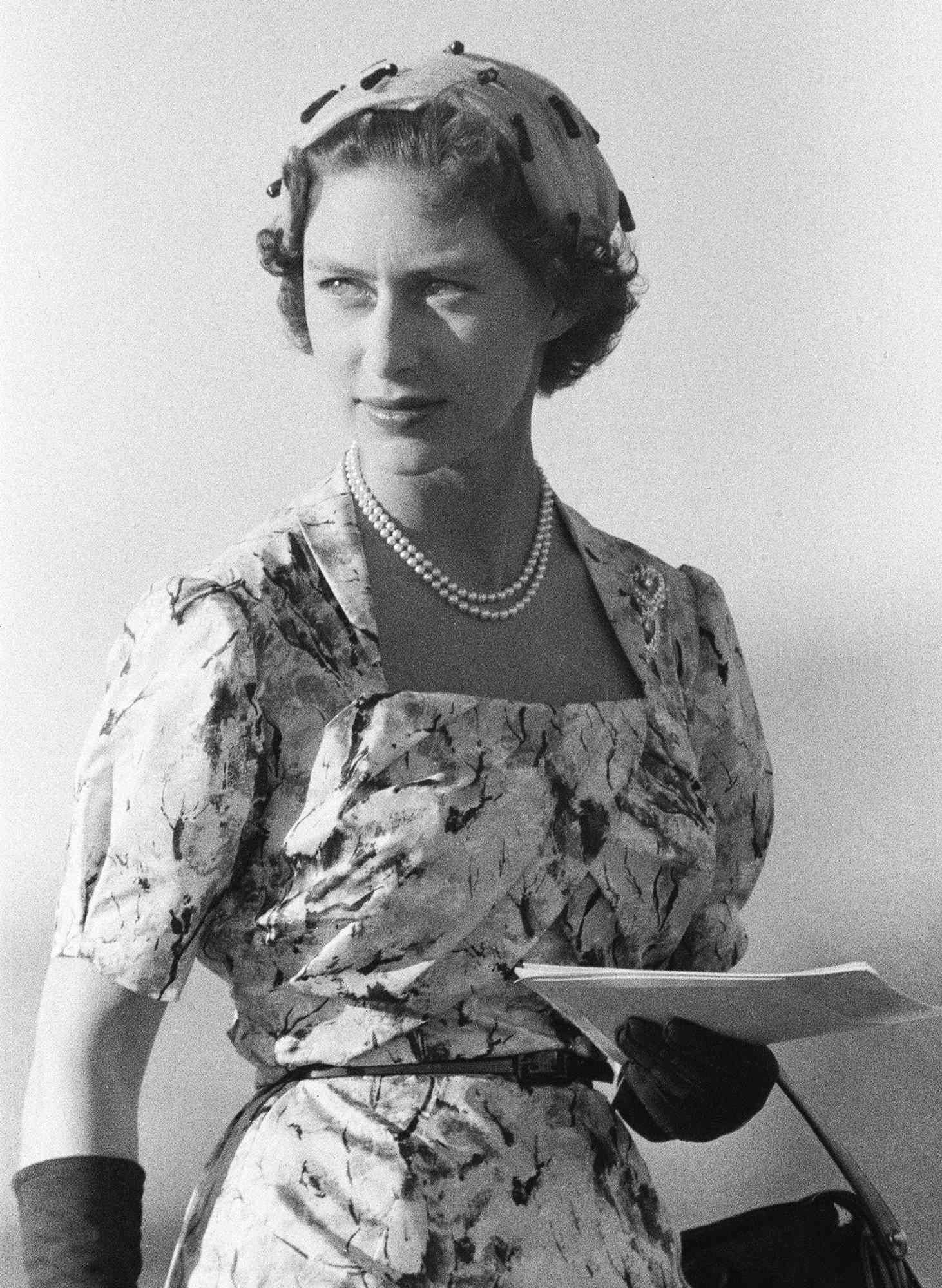 Princess Margaret attends Military Display at Up-Park Camp, Jamaica, at which Her Royal Highness inspected the Jamaica Regiment and took the Salute at the Trooping of the Colour, Monday 12th February 1955