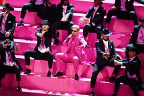 Canadian actor Ryan Gosling (C) performs "I'm Just Ken" from "Barbie" onstage during the 96th Annual Academy Awards at the Dolby Theatre in Hollywood, California on March 10, 2024.