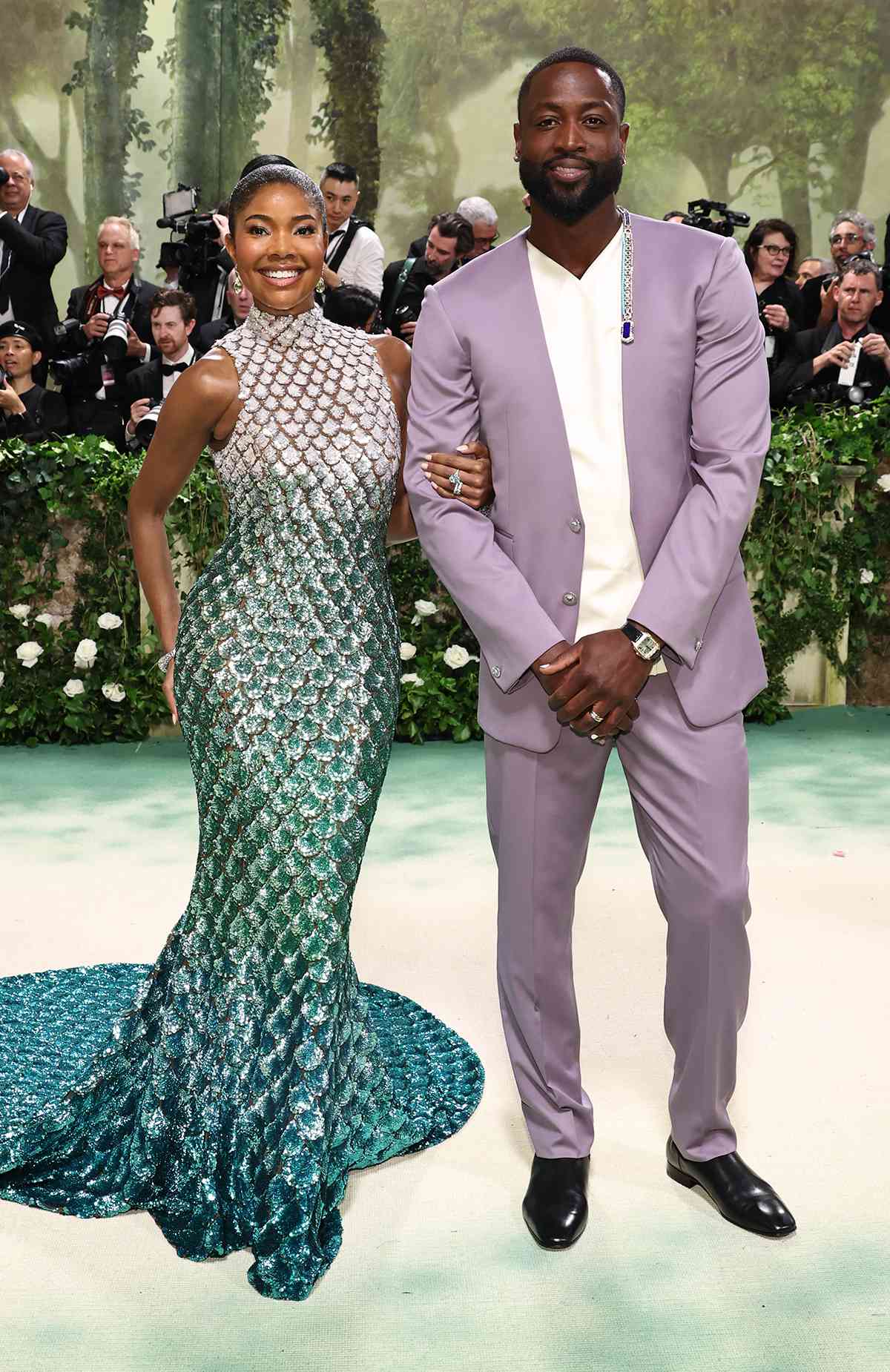 Gabrielle Union and Dwyane Wade attend The 2024 Met Gala Celebrating "Sleeping Beauties: Reawakening Fashion" at The Metropolitan Museum of Art on May 06, 2024 in New York City