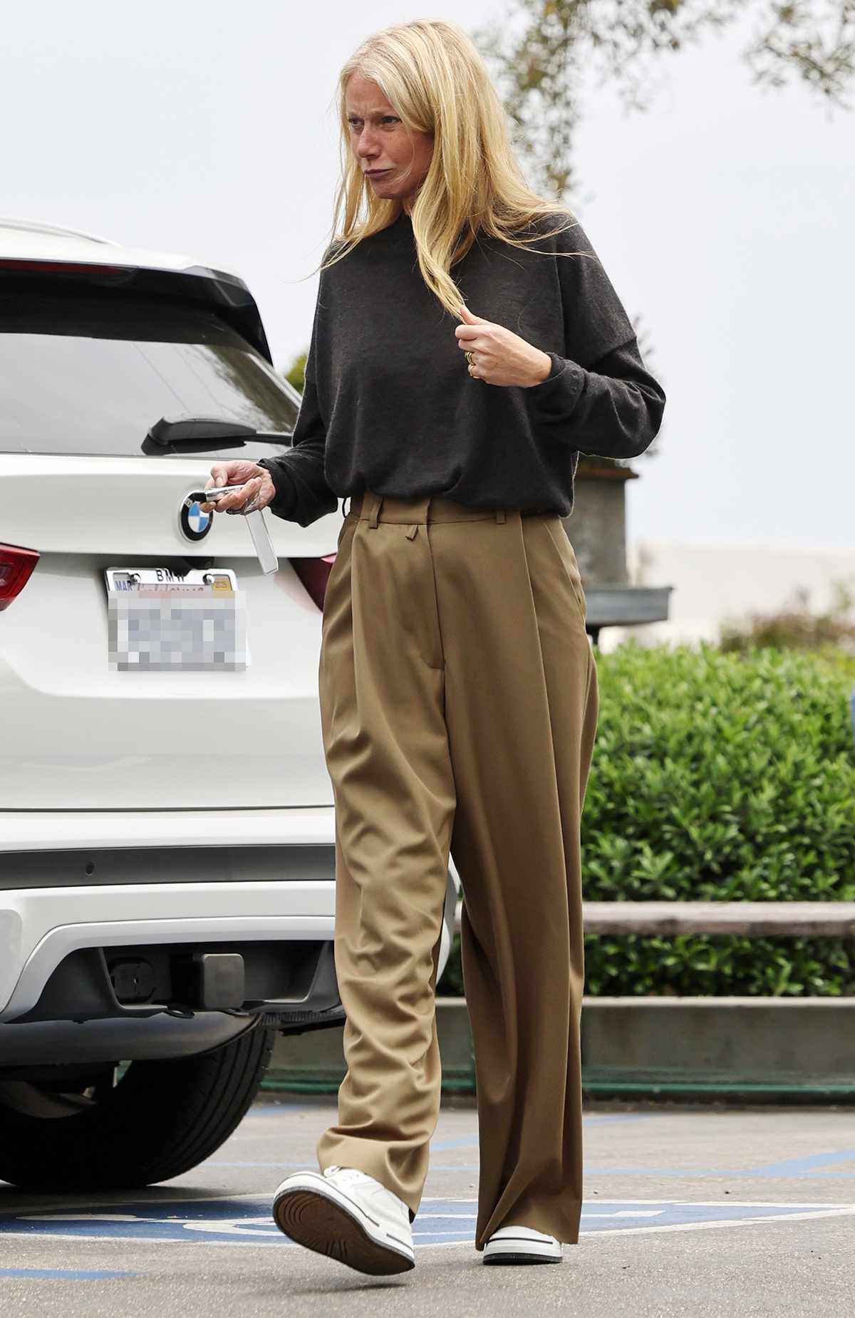 Gwyneth Paltrow is spotted out on a rare occasion with her brother Jake as she takes her mom Blythe Danner and daughter Apple Martin for lunch at a local restaurant in Santa Barbara. The family were seen exiting together as they all got into the same car. 