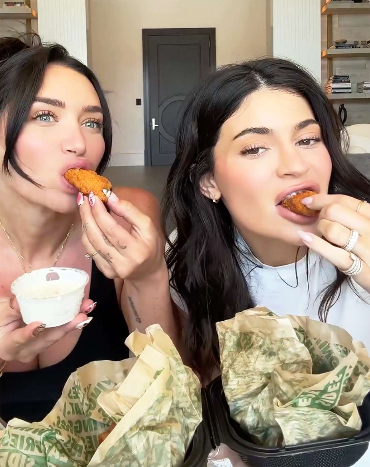 Kylie Jenner and Stassie Karanikolaou eat Wingstop