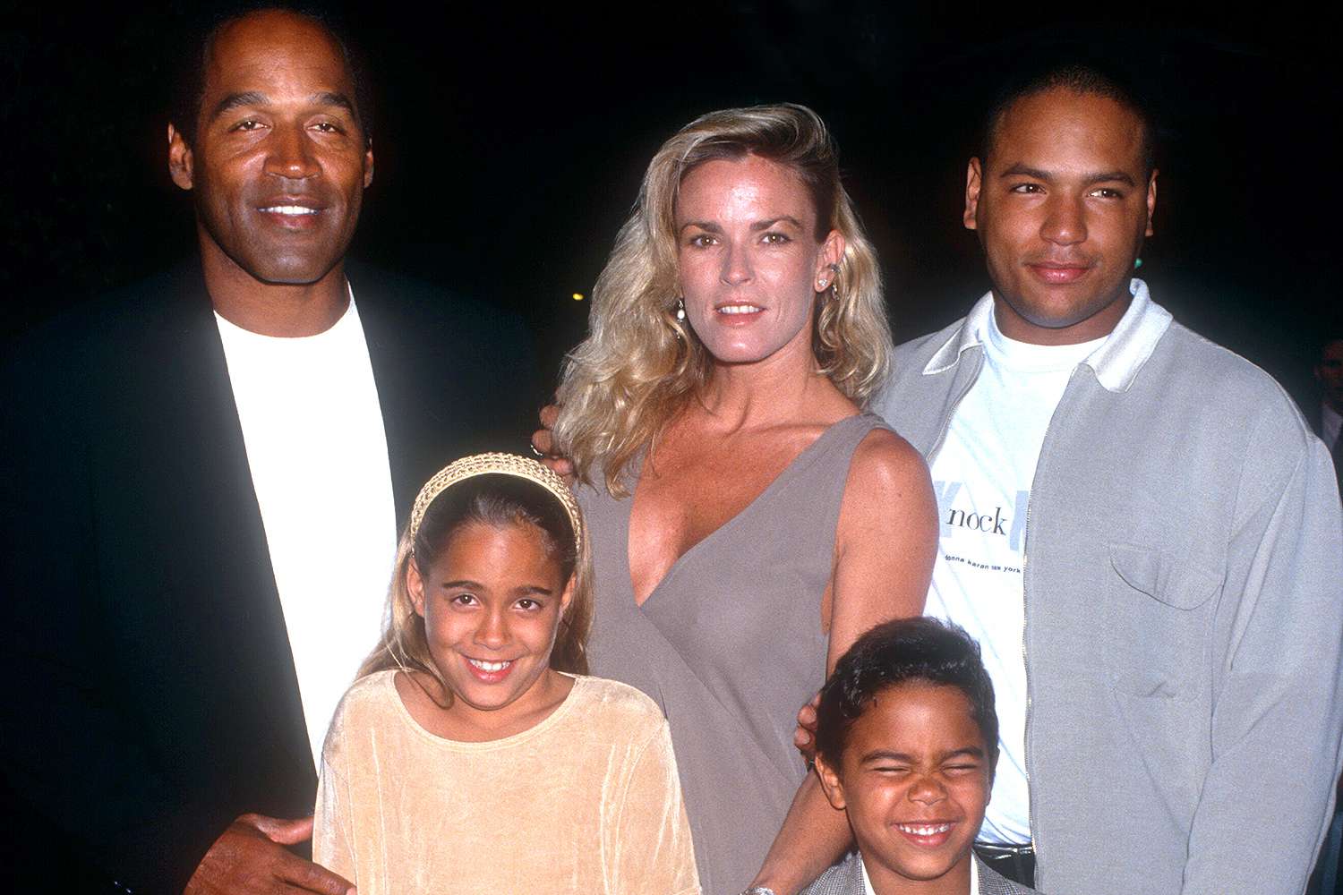  O.J. Simpson and Nicole Brown Simpson (1959-1994) walk the red carpet with their children Jason Simpson, Sydney and Justin as they attend the 'Naked Gun 33 1/3: The Final Insult' 