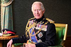 King Charles III taken by Hugo Burnand in the Grand Corridor at Windsor Castle in November 202