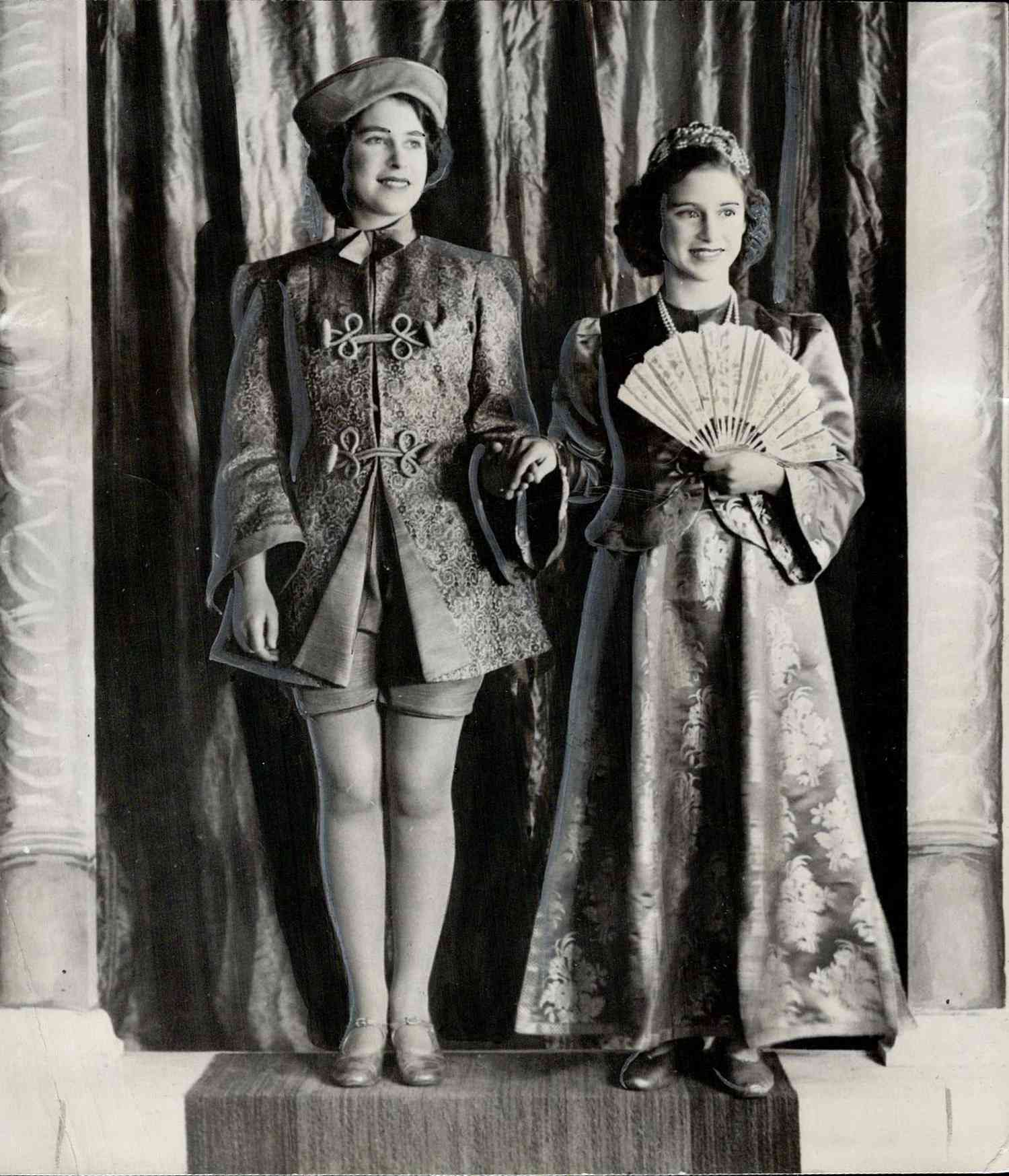 Princess enjoyed playing roles in pantomimes held every Christmas Elizabeth is shown here; left; as Aladdin; Margaret Rose taking Princess Roxana part.