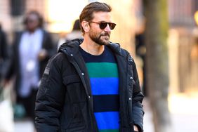 Bradley supported Gigi by wearing a green, black, and blue striped cashmere sweater ($545) from the model's fashion brand, Guest in Residence