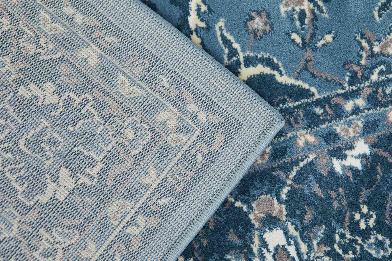 The top and underside of the IKEA VEDBÃK Rug