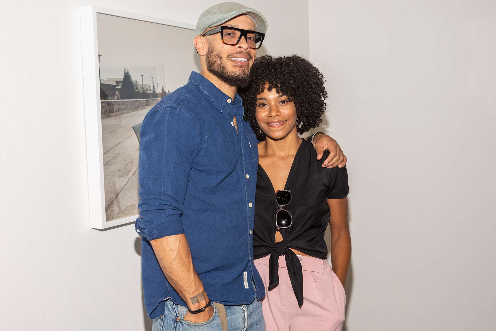 Pete Chatmon and Kelly McCreary attend the private reception celebrating the opening of "Kwame Brathwaite: Celebrity and The Everyday" at Philip Martin Gallery on November 03, 2018 in Los Angeles, California.