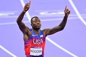 Grant Holloway celebrates after winning the men's 110m hurdles final of the athletics event at the Paris 2024 Olympic Games