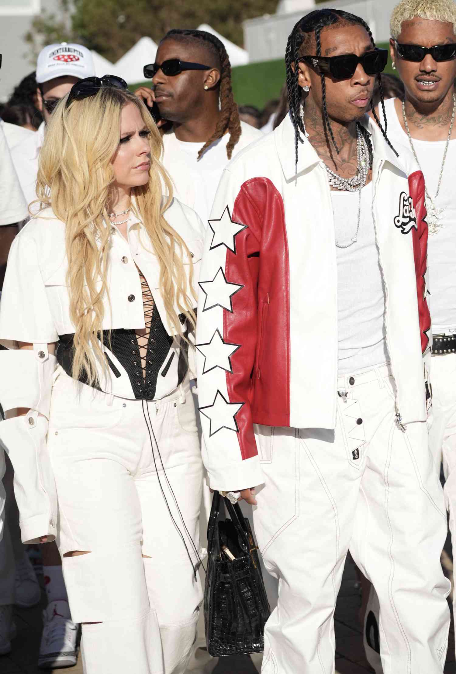 Avril Lavigne and Tyga arrive at Nobu