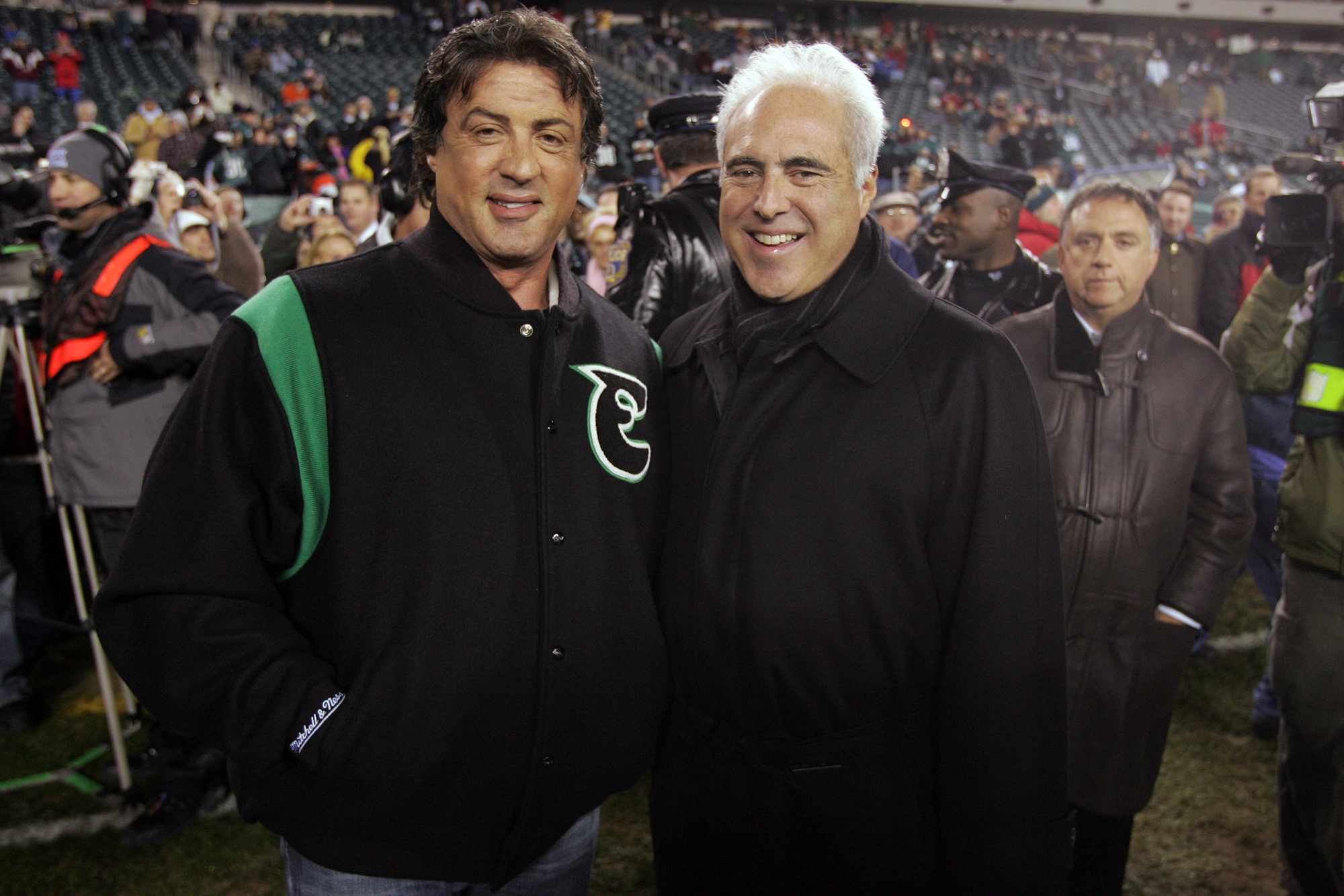 Owner Jeffrey Lurie (L) of the Philadelphia Eagles and Sylvester Stallone (R) pose for a photo before the game against the Carolina Panthers on December 4, 2006 at Lincoln Financial Field in Philadelphia, Pennsylvania. The Eagles defeated the Panthers 27-24.