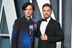 Cole Sprouse and Dylan Sprouse attend the 2022 Vanity Fair Oscar Party hosted by Radhika Jones at Wallis Annenberg Center for the Performing Arts on March 27, 2022 in Beverly Hills, California