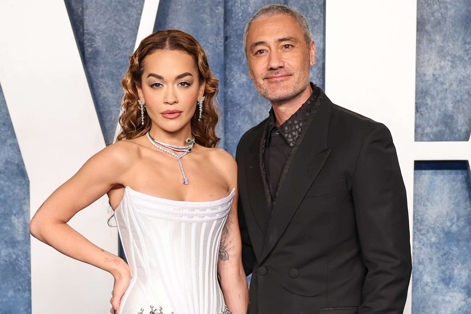 Rita Ora and Taika Waititi attend the 2023 Vanity Fair Oscar Party Hosted By Radhika Jones