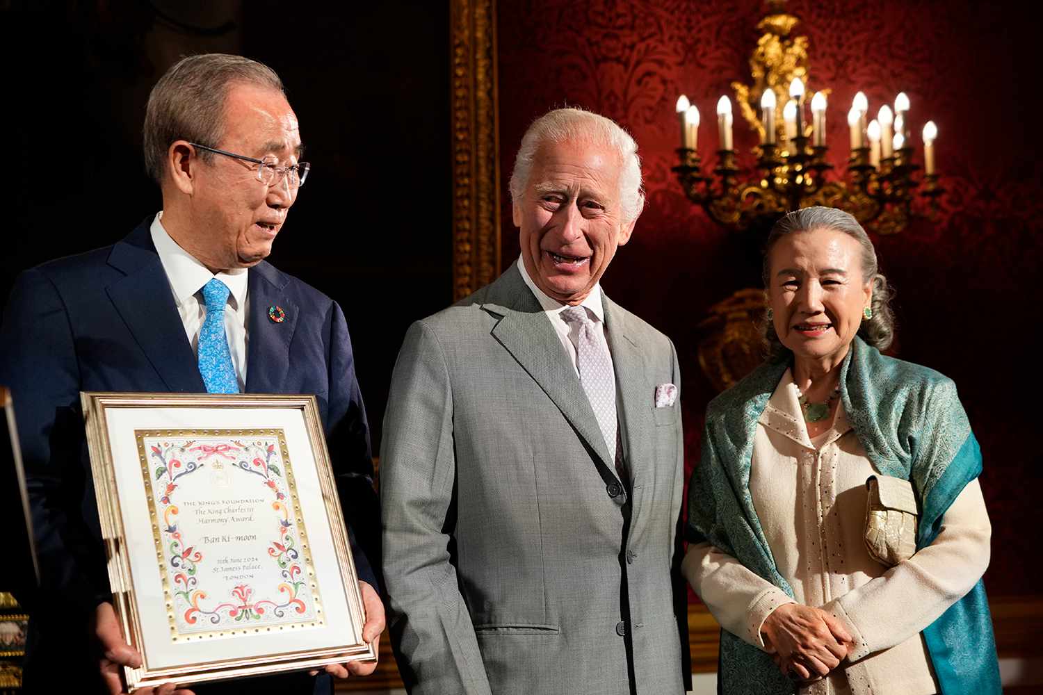 King Charles III, centre, presents the Harmony Award to Ban Ki-moon, left, the former United Nations Secretary General at the inaugural King's Foundation charity awards at St James's Palace on June 11, 2024 in London, England. 