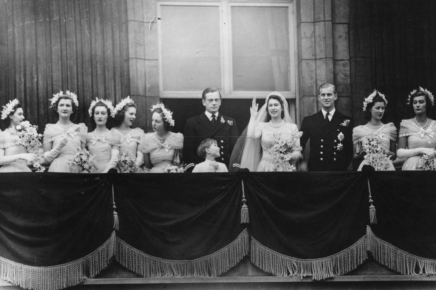 The royal group on the balcony of Buckingham Palace after returning from the wedding ceremony between Princess Elizabeth and the Duke of Edinburgh at Westminster Abbey. (left to right) Princess Margaret