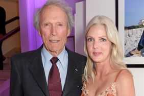 Clint Eastwood (L) and Christina Sandera attend the Vanity Fair and Chopard Party celebrating the Cannes Film Festival at Hotel du Cap-Eden-Roc on May 20, 2017 in Cap d'Antibes, France
