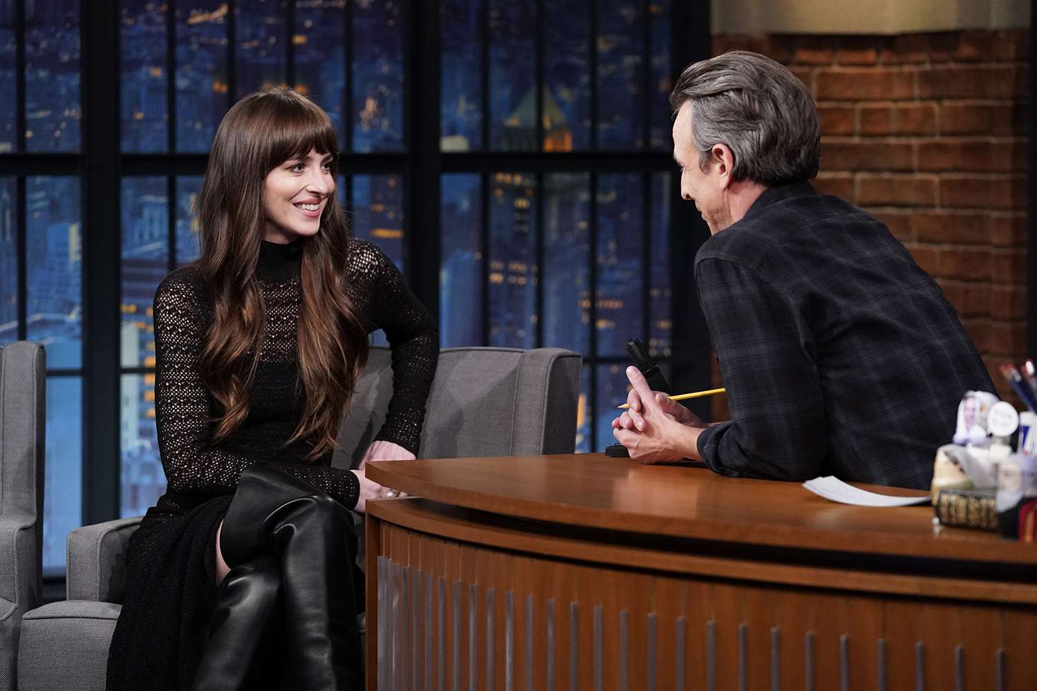 Dakota Johnson during an interview with host Seth Meyers