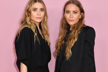 Mary-Kate (R) and Ashley Olsen arrive for the 2019 CFDA fashion awards