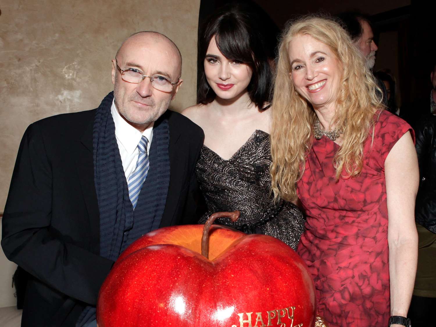 Phil Collins, actress Lily Collins, and Jill Tavelman attend the after party for Relativity Media's "Mirror Mirror"