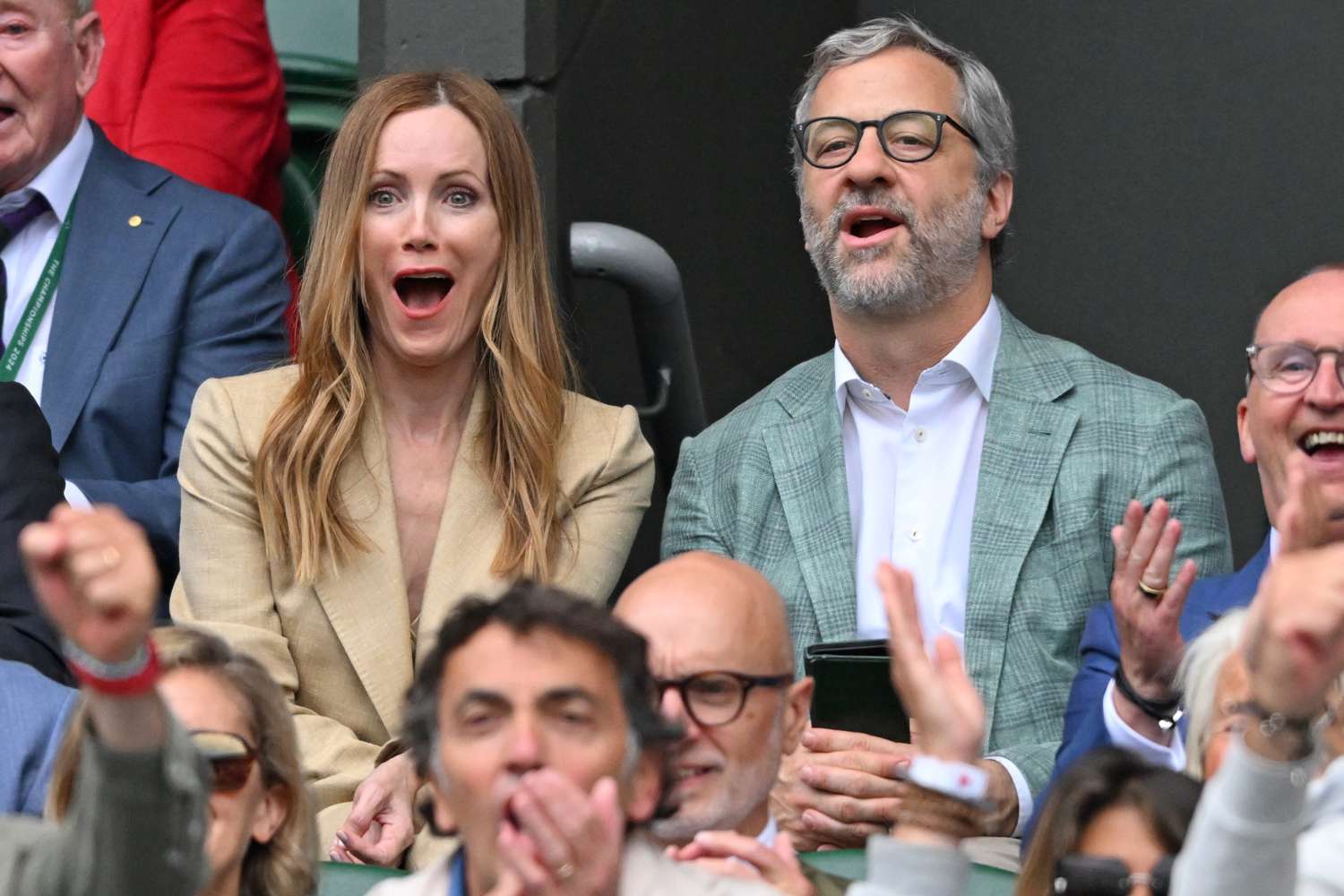 Leslie Mann and Judd Apatow court-side of Centre Court on day twelve of the Wimbledon Tennis Championships at the 