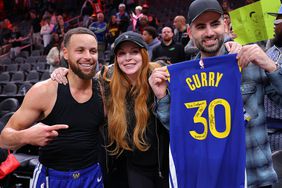 Lindsay Lohan Greets Steph Curry with a Hug as They Chat Before Golden State Warriors Game