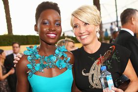 Actress Lupita Nyong'o (L) and Emma Thompson attend 20th Annual Screen Actors Guild Awards at The Shrine Auditorium on January 18, 2014 in Los Angeles, California.